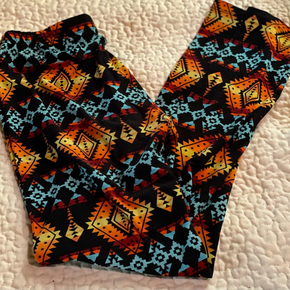 2 pairs of leggings -Small- fall colored themed! Preowned!